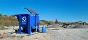 EnviroHub HL50 lamella clarifier operating on a quarry site with solar panel and connected hoses