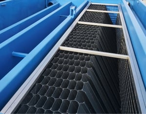 Internal plate system inside a Prime hybrid settling tank for water treatment