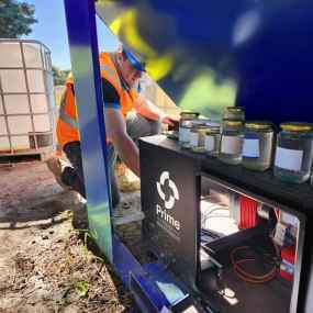 Prime water treatment dosing system set up on a construction site